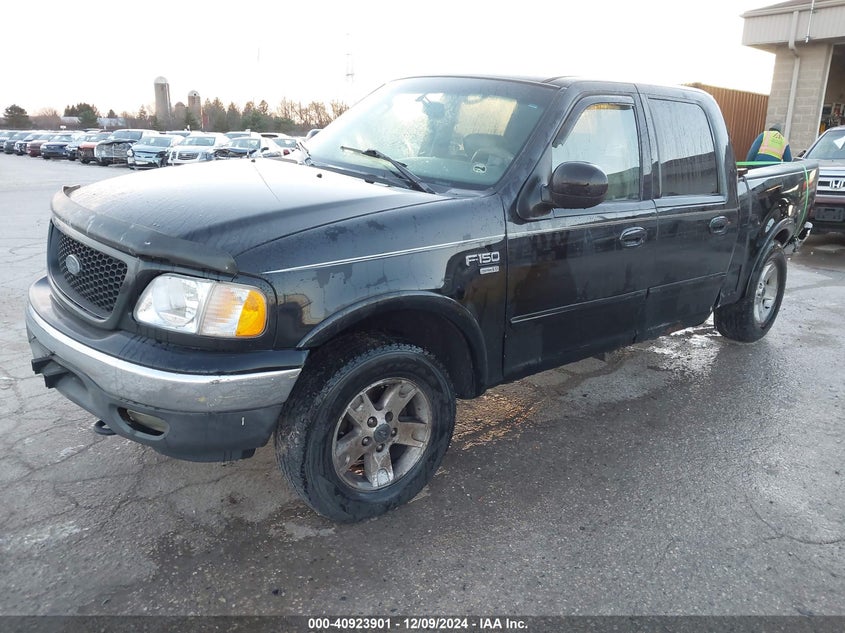 2002 Ford F-150, Изъятое, IAAI, VIN 1FTRW08L52KC40351 — фото 2
