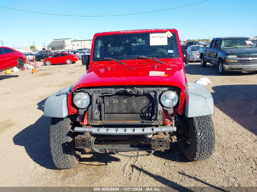 2015 Jeep Wrangler Willys Wheeler VIN: 1C4GJWAG4FL599051 Lot: 40925606