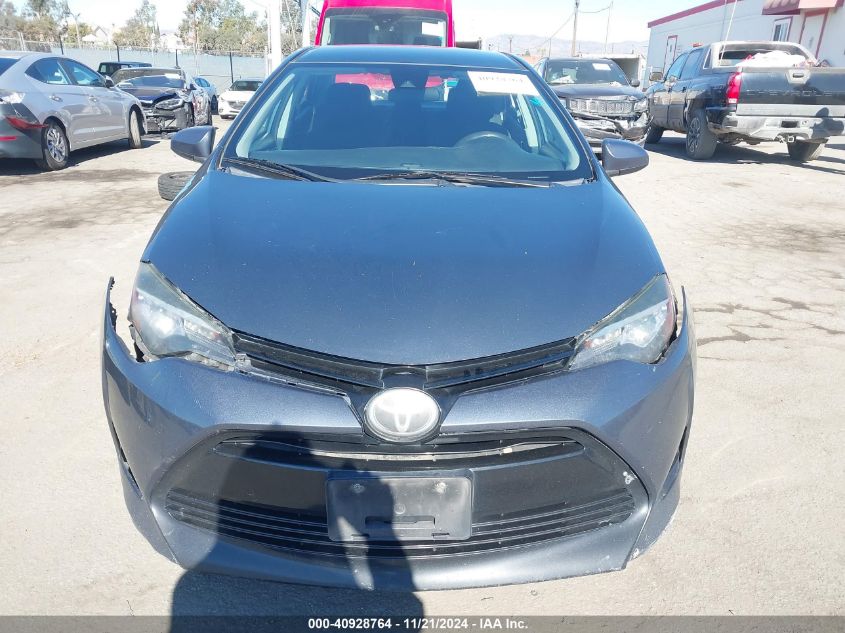 2017 Toyota Corolla Le VIN: 5YFBURHE9HP621627 Lot: 40928764