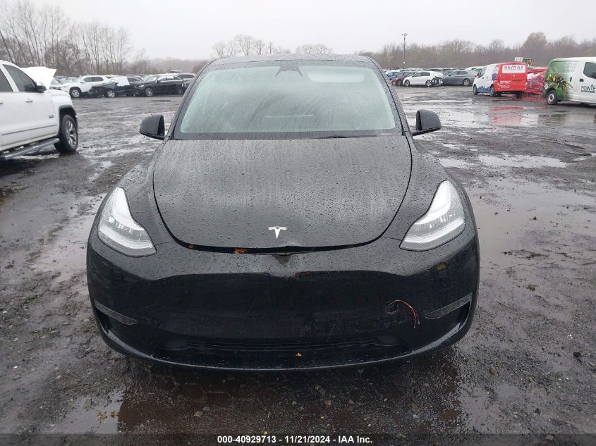 2023 Tesla Model Y Awd/Long Range Dual Motor All-Wheel Drive VIN: 7SAYGAEE8PF610509 Lot: 40929713