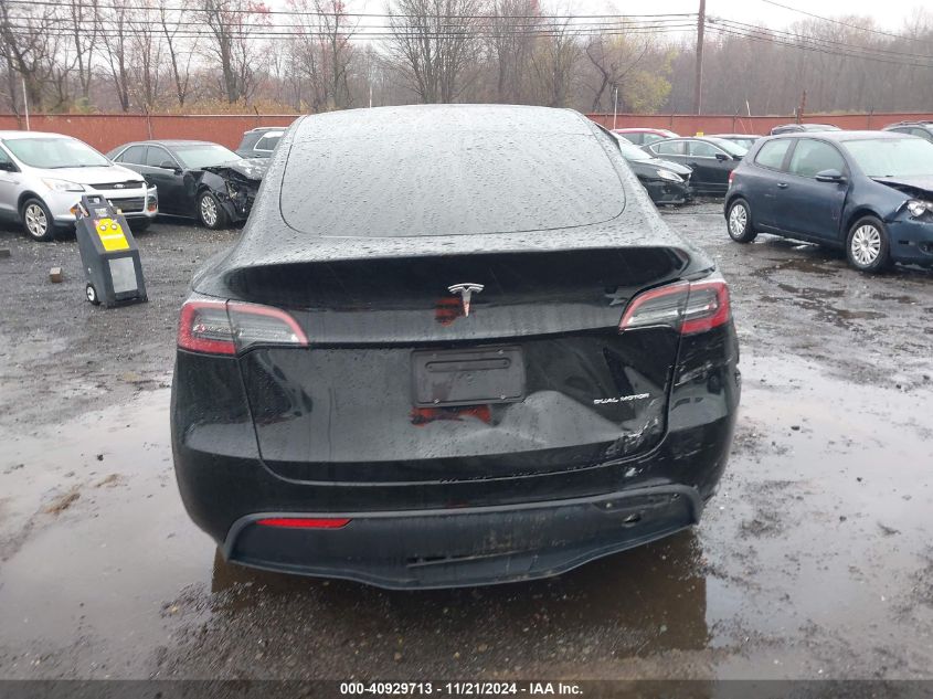 2023 Tesla Model Y Awd/Long Range Dual Motor All-Wheel Drive VIN: 7SAYGAEE8PF610509 Lot: 40929713