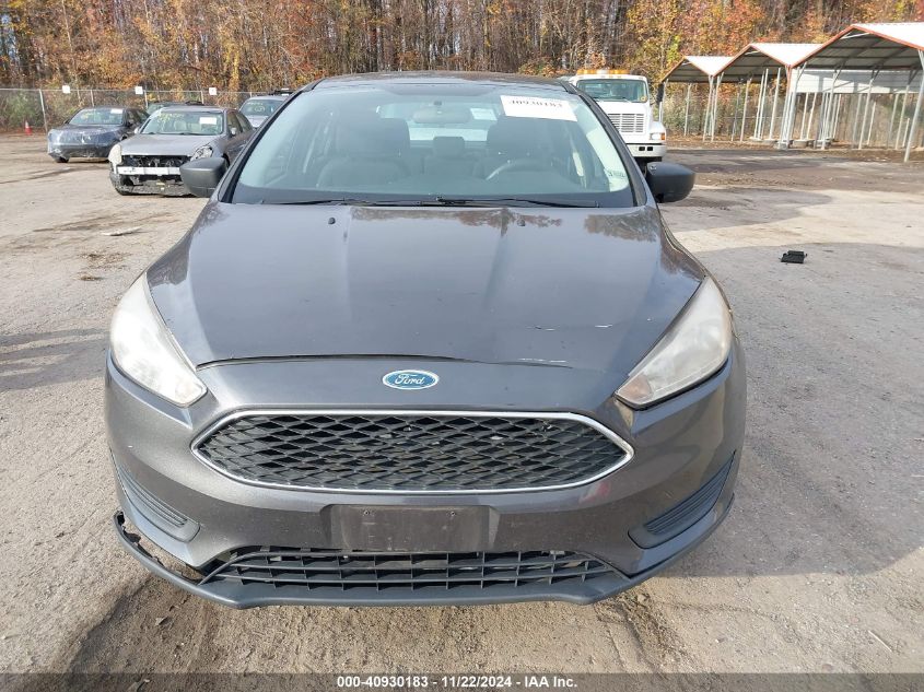 2015 Ford Focus S VIN: 1FADP3E25FL312109 Lot: 40930183