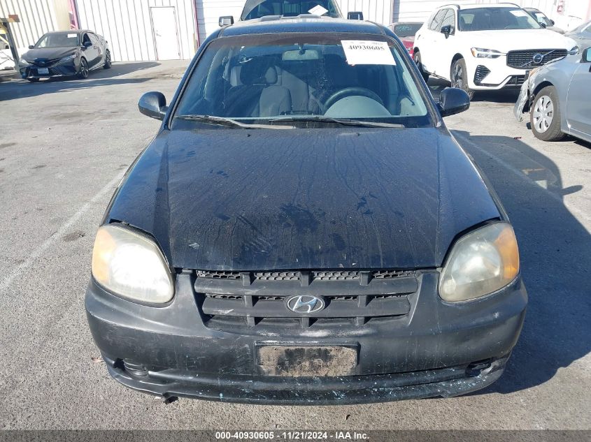 2004 Hyundai Accent Gl VIN: KMHCG45C74U566282 Lot: 40930605