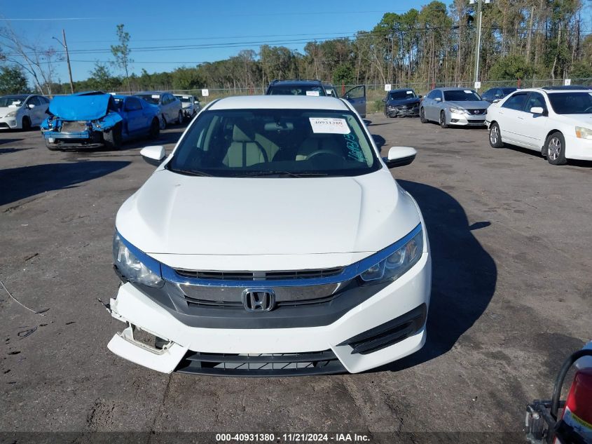 2018 Honda Civic Lx VIN: 19XFC2F50JE008303 Lot: 40931380