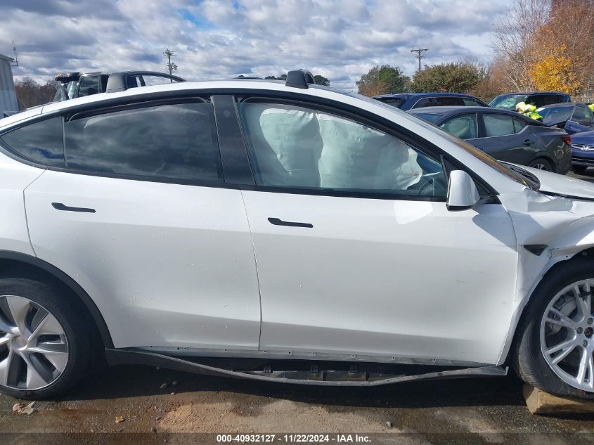 2023 Tesla Model Y Awd/Long Range Dual Motor All-Wheel Drive VIN: 7SAYGDEE9PA104184 Lot: 40932127