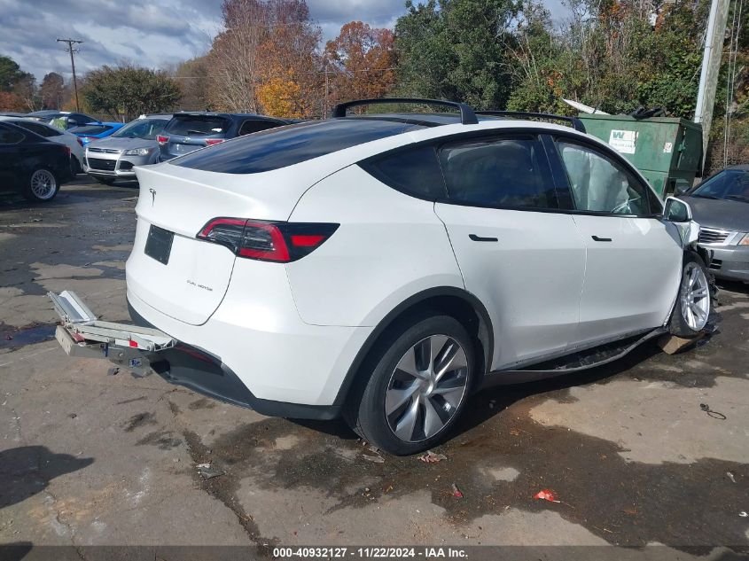 VIN 7SAYGDEE9PA104184 2023 TESLA MODEL Y no.4