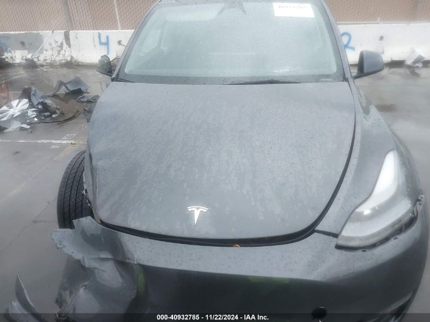 2023 Tesla Model Y Awd/Long Range Dual Motor All-Wheel Drive VIN: 7SAYGDEE9PF922159 Lot: 40932785