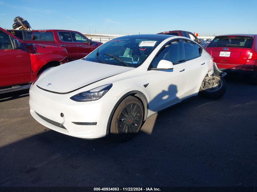 2023 Tesla Model Y Awd/Long Range Dual Motor All-Wheel Drive VIN: 7SAYGDEE7PA042008 Lot: 40934083