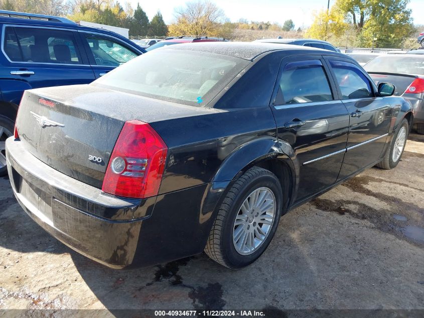 2009 Chrysler 300 Lx VIN: 2C3KA43D09H577989 Lot: 40934677