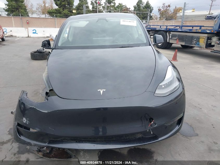 2024 Tesla Model Y Long Range Dual Motor All-Wheel Drive VIN: 7SAYGDEE6RF025657 Lot: 40934875