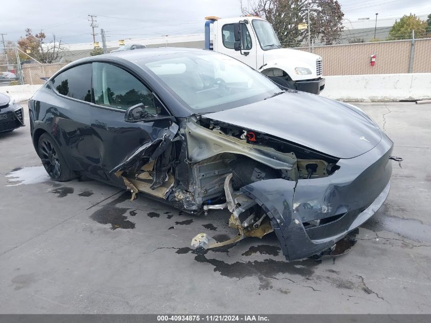 2024 Tesla Model Y Long Range Dual Motor All-Wheel Drive VIN: 7SAYGDEE6RF025657 Lot: 40934875