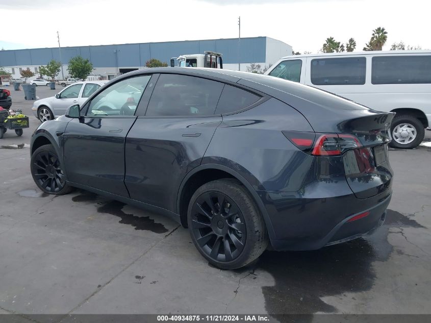 2024 Tesla Model Y Long Range Dual Motor All-Wheel Drive VIN: 7SAYGDEE6RF025657 Lot: 40934875