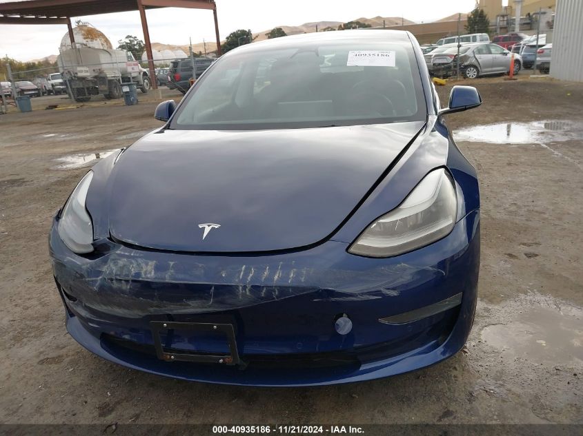 2022 Tesla Model 3 Long Range Dual Motor All-Wheel Drive VIN: 5YJ3E1EB0NF165151 Lot: 40935186