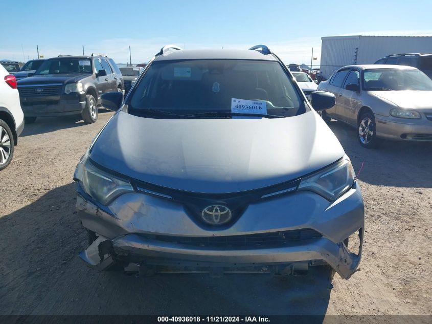 2018 Toyota Rav4 Le VIN: JTMZFREV7JD125151 Lot: 40936018