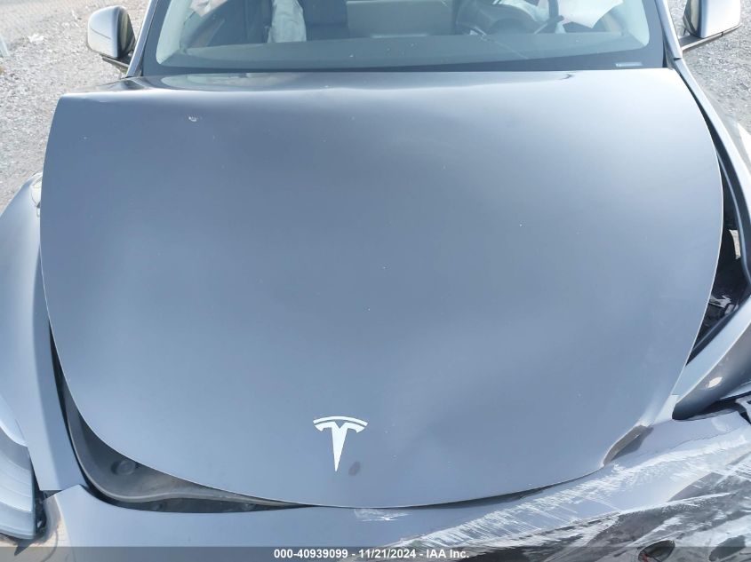 2023 Tesla Model Y Awd/Long Range Dual Motor All-Wheel Drive VIN: 7SAYGAEE0PF907791 Lot: 40939099