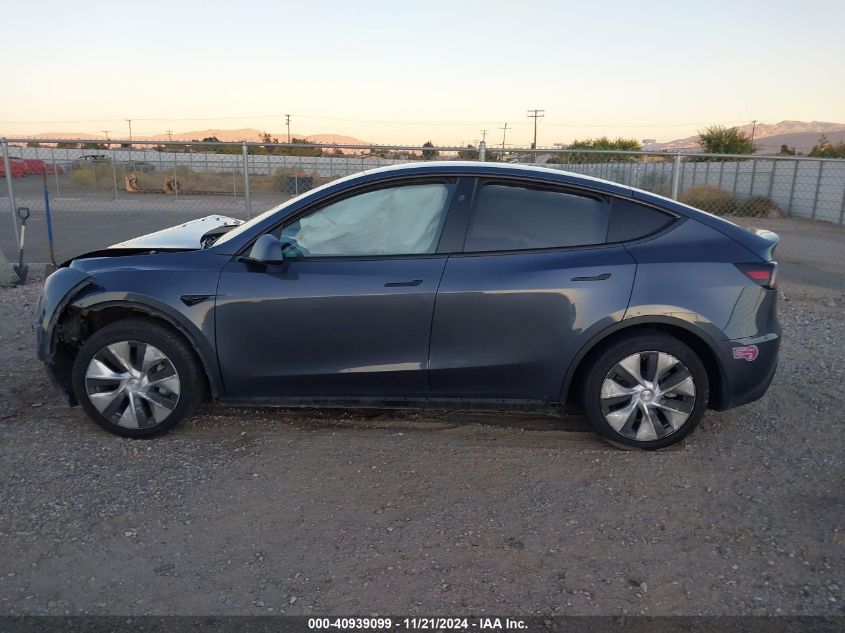 2023 Tesla Model Y Awd/Long Range Dual Motor All-Wheel Drive VIN: 7SAYGAEE0PF907791 Lot: 40939099