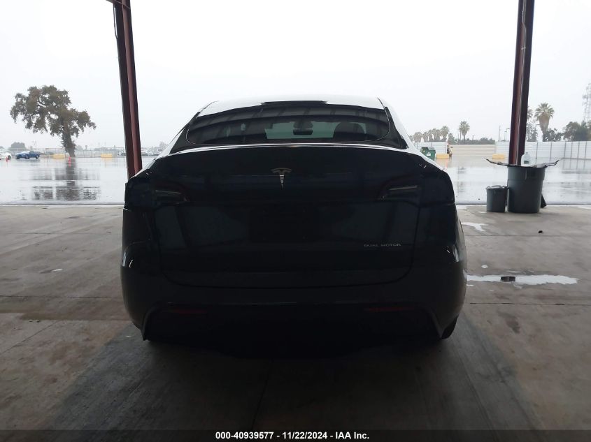 2023 Tesla Model Y Awd/Long Range Dual Motor All-Wheel Drive VIN: 7SAYGDEE2PA200058 Lot: 40939577