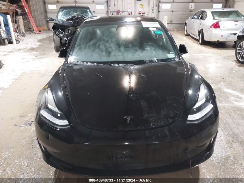 2021 Tesla Model 3 Standard Range Plus Rear-Wheel Drive VIN: 5YJ3E1EAXMF994184 Lot: 40940733