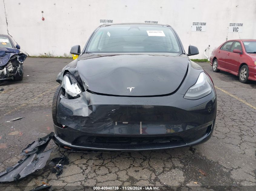 2024 Tesla Model Y Long Range Dual Motor All-Wheel Drive VIN: 7SAYGDEE1RF102483 Lot: 40940739