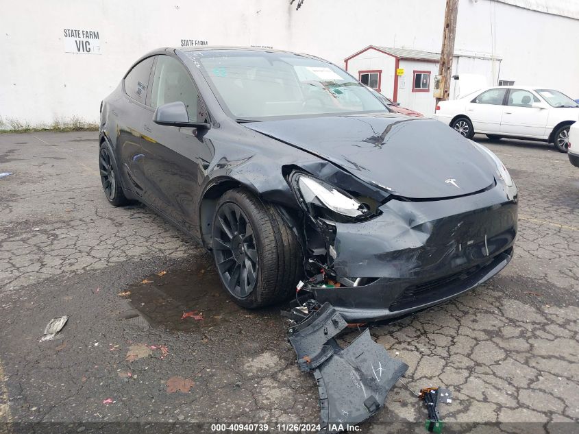 2024 Tesla Model Y Long Range Dual Motor All-Wheel Drive VIN: 7SAYGDEE1RF102483 Lot: 40940739