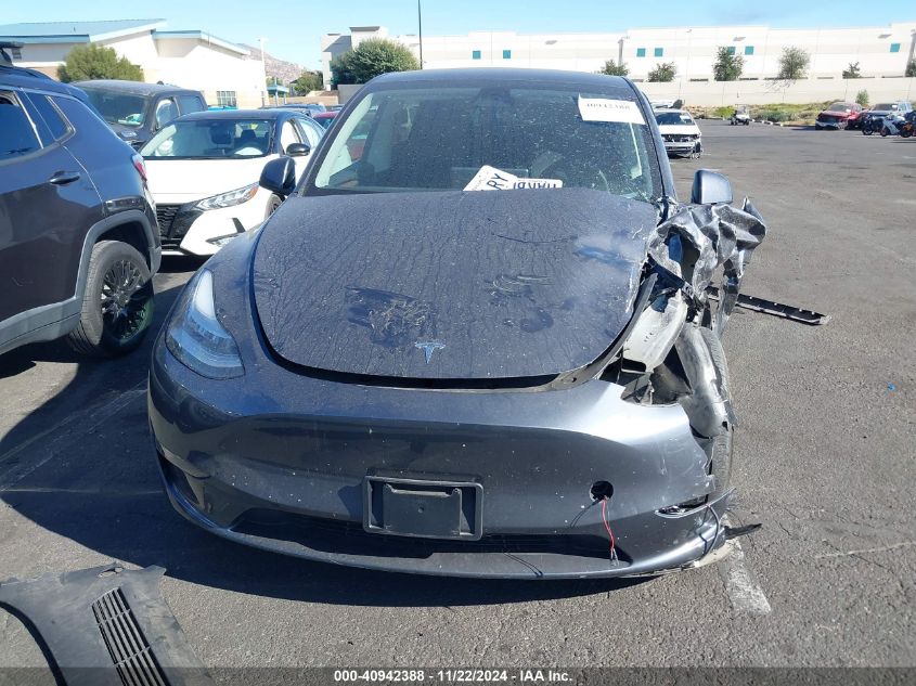 2023 Tesla Model Y Awd/Long Range Dual Motor All-Wheel Drive VIN: 7SAYGAEE3PF605749 Lot: 40942388