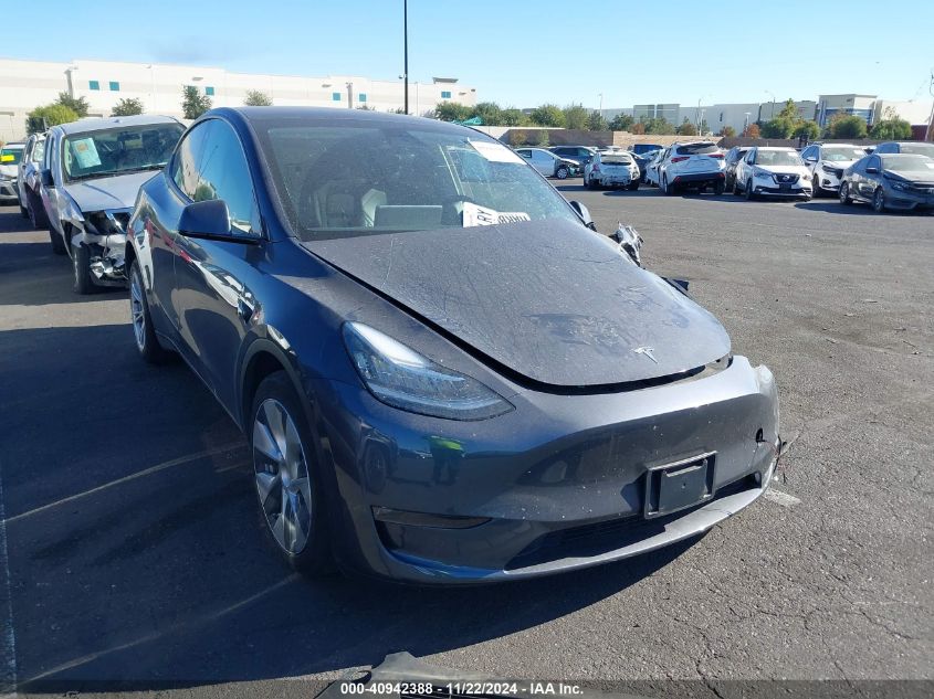 2023 Tesla Model Y Awd/Long Range Dual Motor All-Wheel Drive VIN: 7SAYGAEE3PF605749 Lot: 40942388