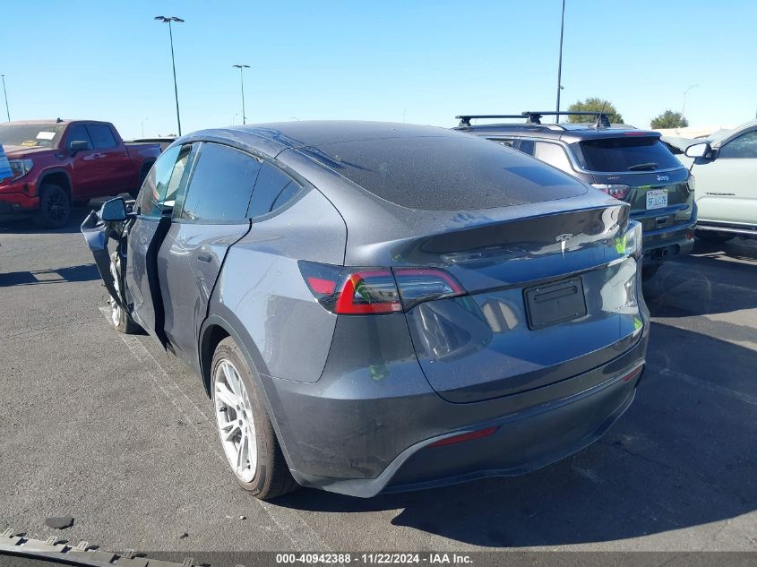 2023 Tesla Model Y Awd/Long Range Dual Motor All-Wheel Drive VIN: 7SAYGAEE3PF605749 Lot: 40942388