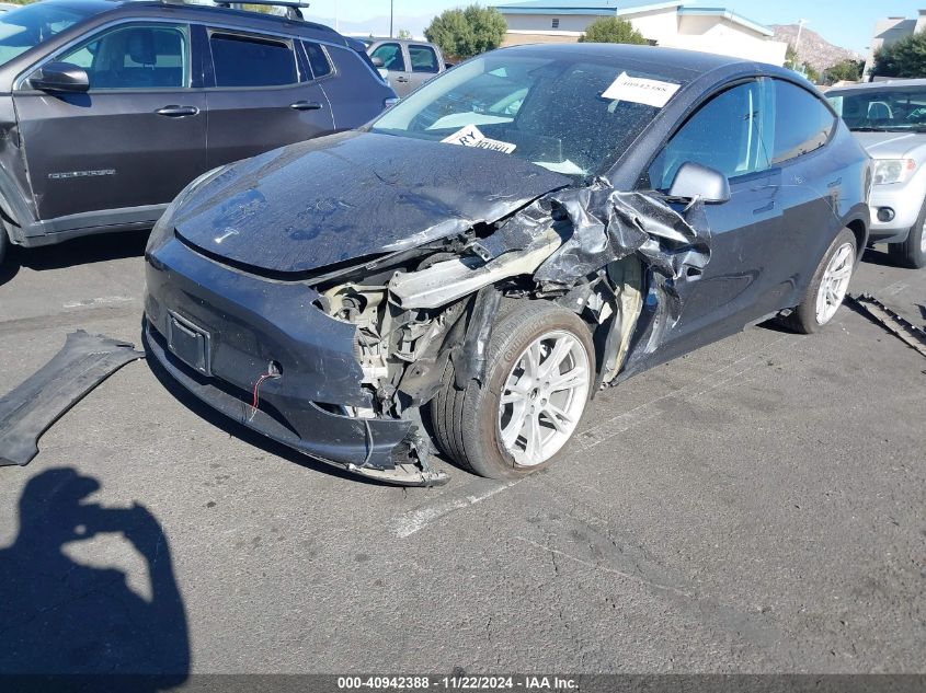 2023 Tesla Model Y Awd/Long Range Dual Motor All-Wheel Drive VIN: 7SAYGAEE3PF605749 Lot: 40942388