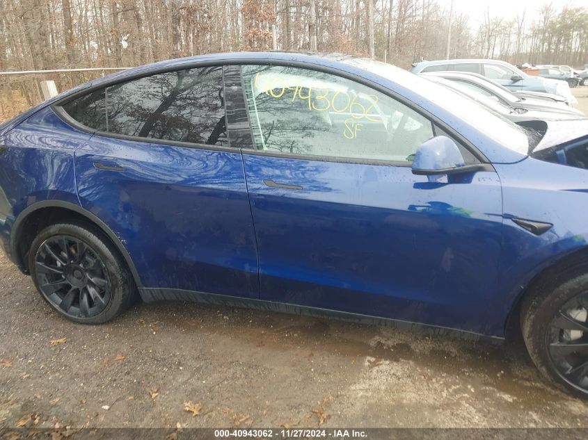 2023 Tesla Model Y Awd/Long Range Dual Motor All-Wheel Drive VIN: 7SAYGDEE8PF875738 Lot: 40943062