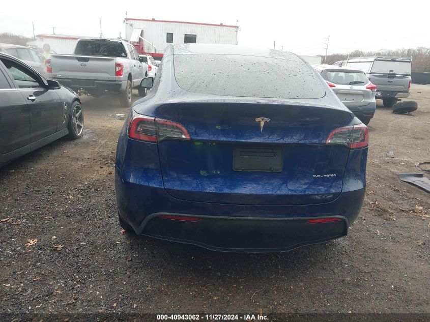 2023 Tesla Model Y Awd/Long Range Dual Motor All-Wheel Drive VIN: 7SAYGDEE8PF875738 Lot: 40943062