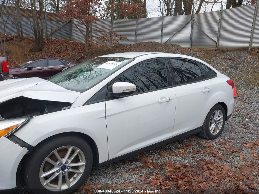 VIN 1FADP3F23HL216710 2017 FORD FOCUS no.12