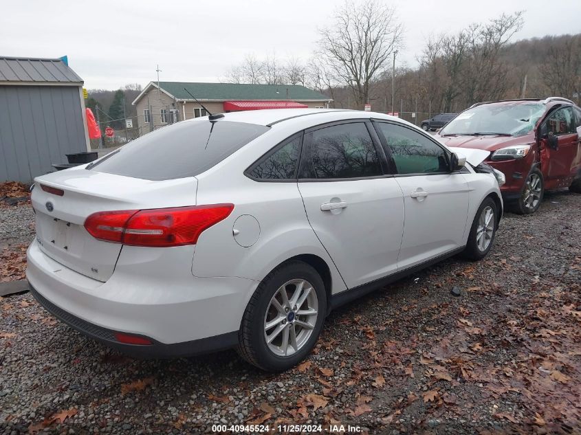 VIN 1FADP3F23HL216710 2017 FORD FOCUS no.4