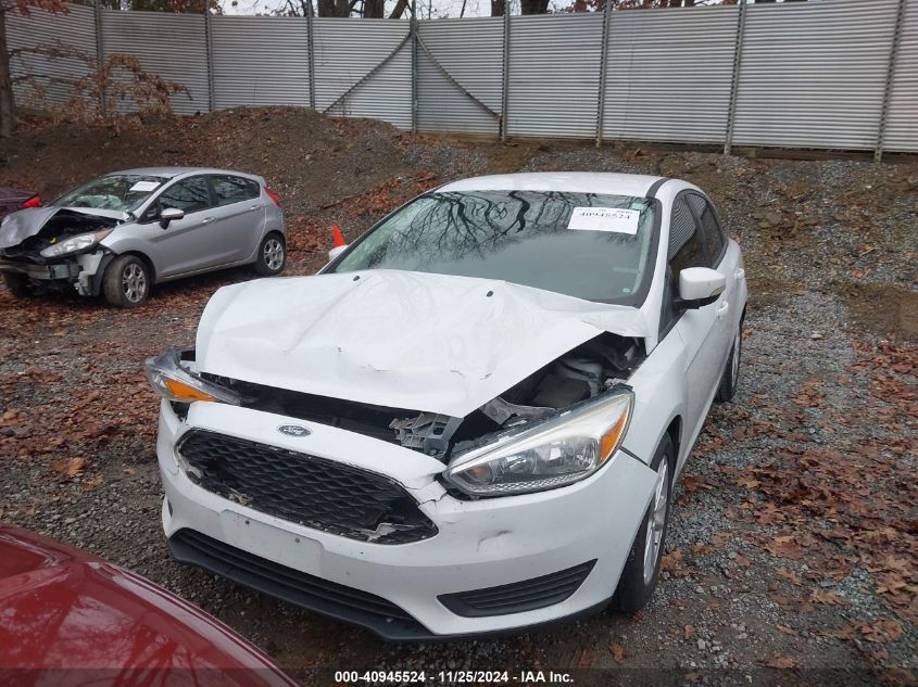 VIN 1FADP3F23HL216710 2017 FORD FOCUS no.6