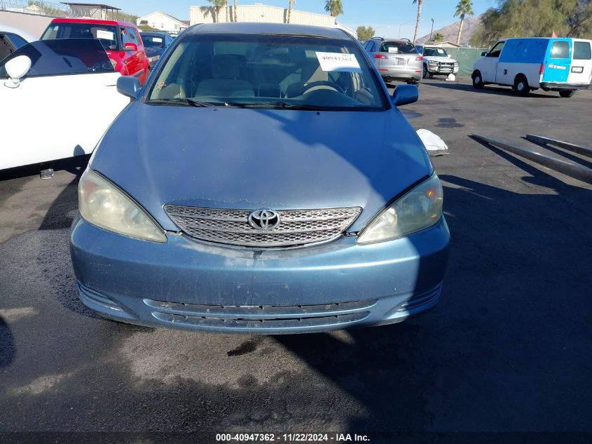 2003 Toyota Camry Le VIN: 4T1BE32K93U774136 Lot: 40947362