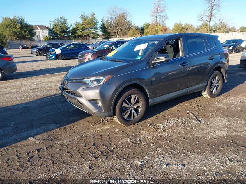2018 TOYOTA RAV4 XLE VIN: 2T3RFREV5JW706098