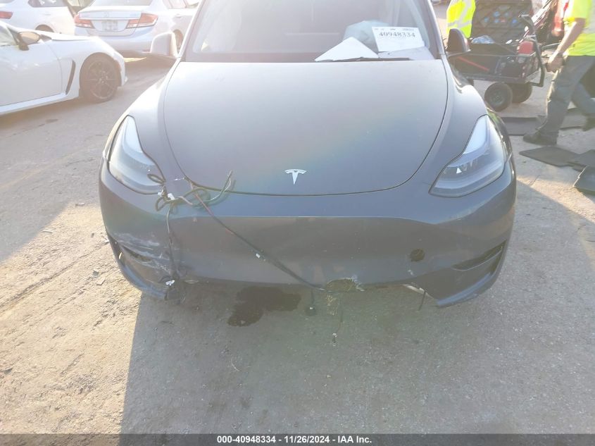 2023 Tesla Model Y Performance Dual Motor All-Wheel Drive VIN: 7SAYGDEF0PF970660 Lot: 40948334