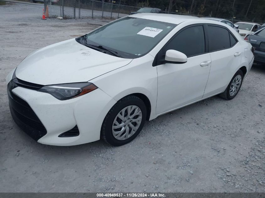 VIN 5YFBURHE4JP768377 2018 Toyota Corolla, LE no.2