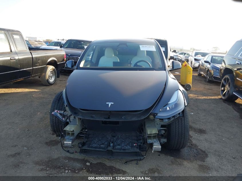 2024 Tesla Model Y Long Range Dual Motor All-Wheel Drive/Rwd VIN: 7SAYGDED6RF103670 Lot: 40952033