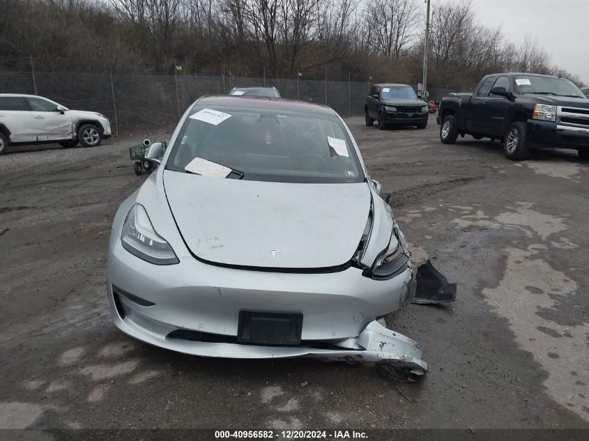 2018 Tesla Model 3 Long Range/Mid Range VIN: 5YJ3E1EA4JF019143 Lot: 40956582