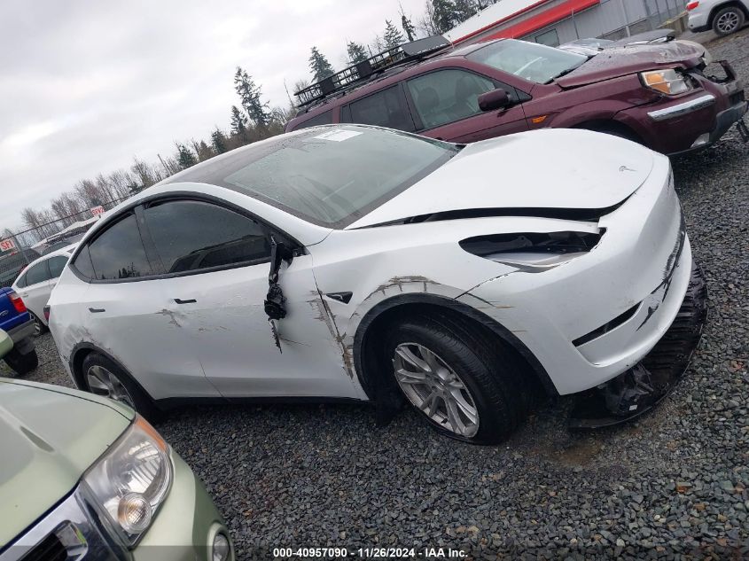 2023 Tesla Model Y Awd/Long Range Dual Motor All-Wheel Drive VIN: 7SAYGDEE8PF686040 Lot: 40957090