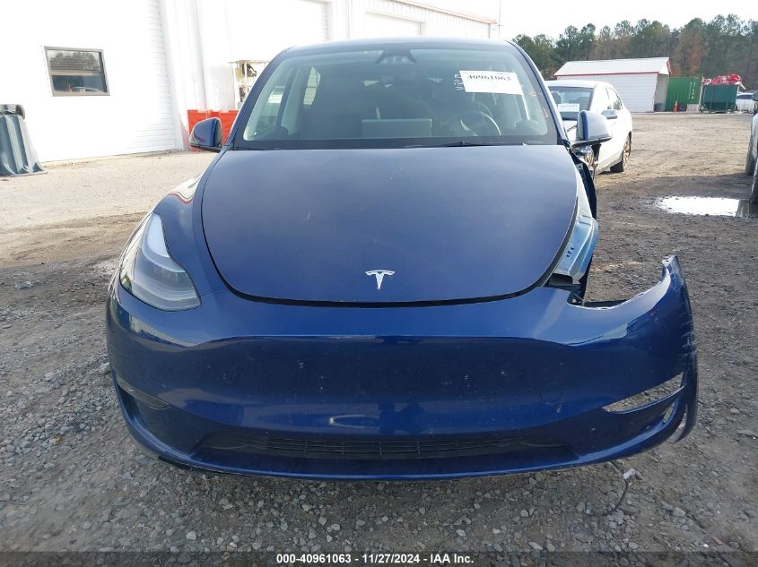 2023 Tesla Model Y Awd/Long Range Dual Motor All-Wheel Drive VIN: 7SAYGAEE3PF970786 Lot: 40961063