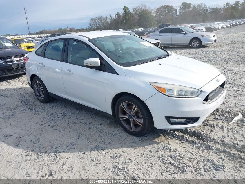 VIN 1FADP3FE3HL294057 2017 FORD FOCUS no.1