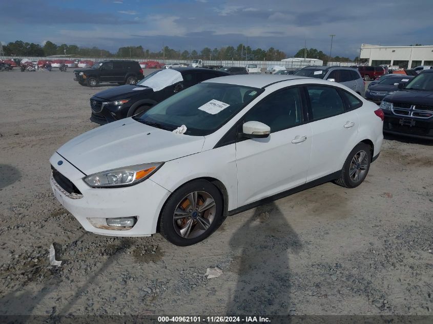 VIN 1FADP3FE3HL294057 2017 FORD FOCUS no.2