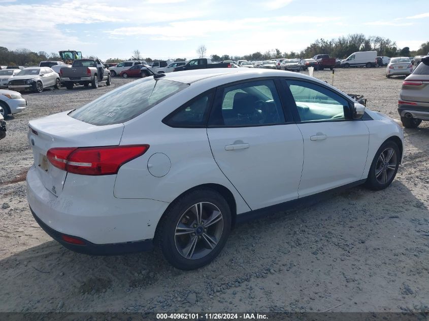 VIN 1FADP3FE3HL294057 2017 FORD FOCUS no.4