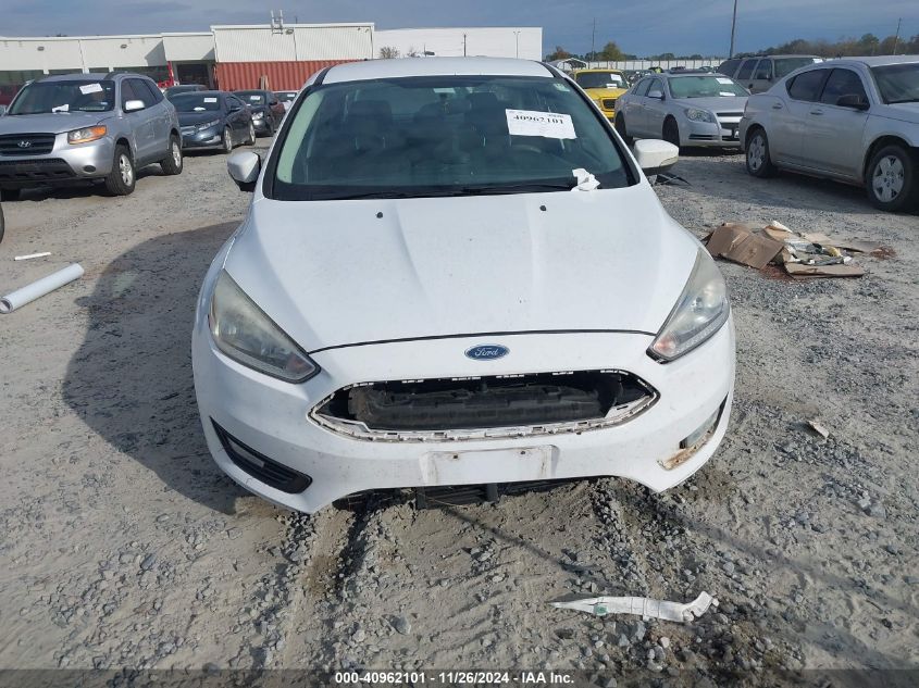 VIN 1FADP3FE3HL294057 2017 FORD FOCUS no.6