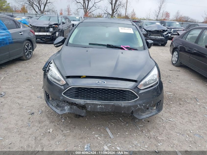 VIN 1FADP3K21HL335751 2017 Ford Focus, SE no.12