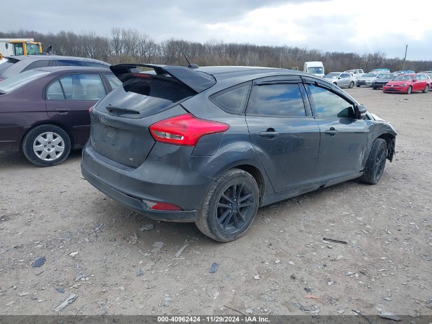 VIN 1FADP3K21HL335751 2017 Ford Focus, SE no.4