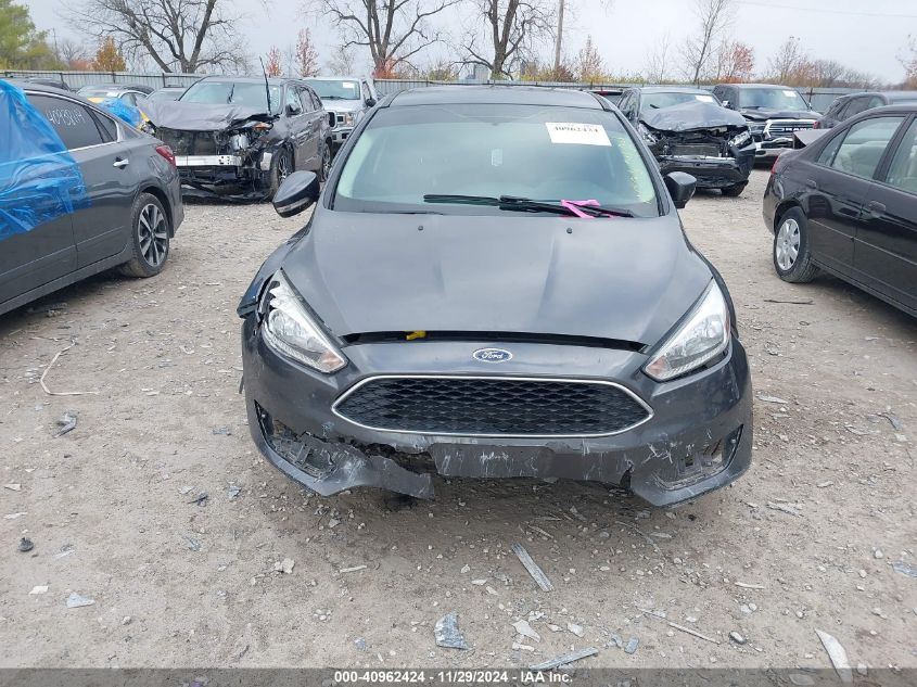 VIN 1FADP3K21HL335751 2017 Ford Focus, SE no.6