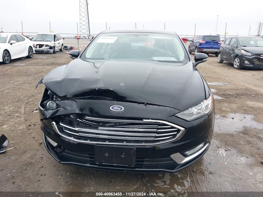 VIN 3FA6P0LU4HR310125 2017 FORD FUSION HYBRID SE