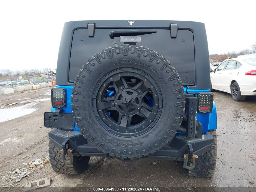 2015 Jeep Wrangler Unlimited Sahara VIN: 1C4BJWEG9FL516511 Lot: 40964930